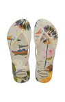 Colorful floral-patterned insoles on a white background